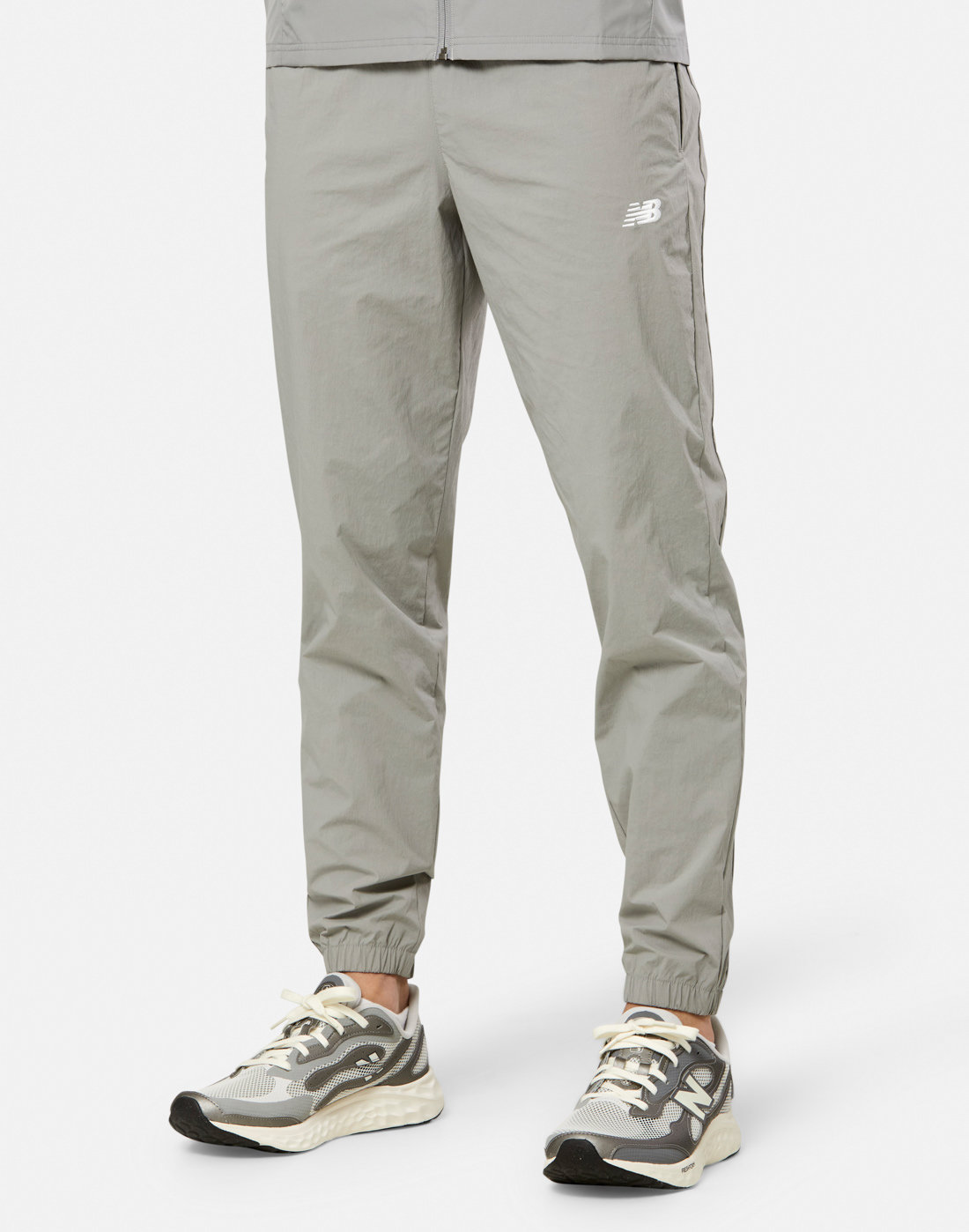 Men's New Balance Stretch Woven Joggers in Grey | Medium