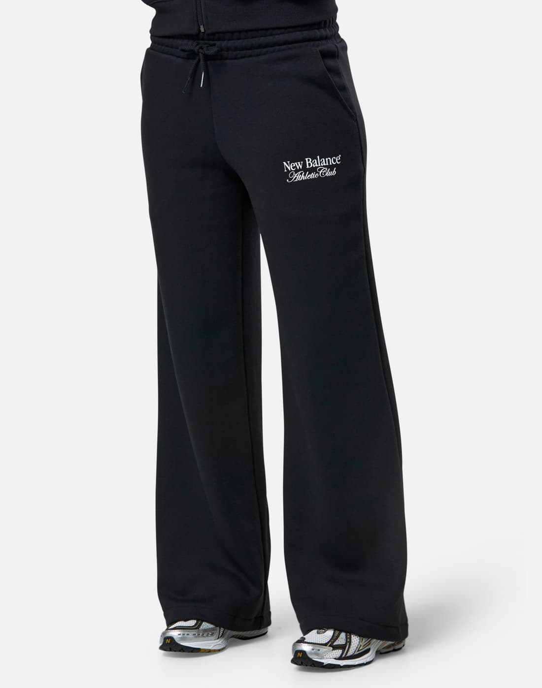 Women's New Balance Linear Heritage Wide Leg Joggers in Black | Large | Fleece
